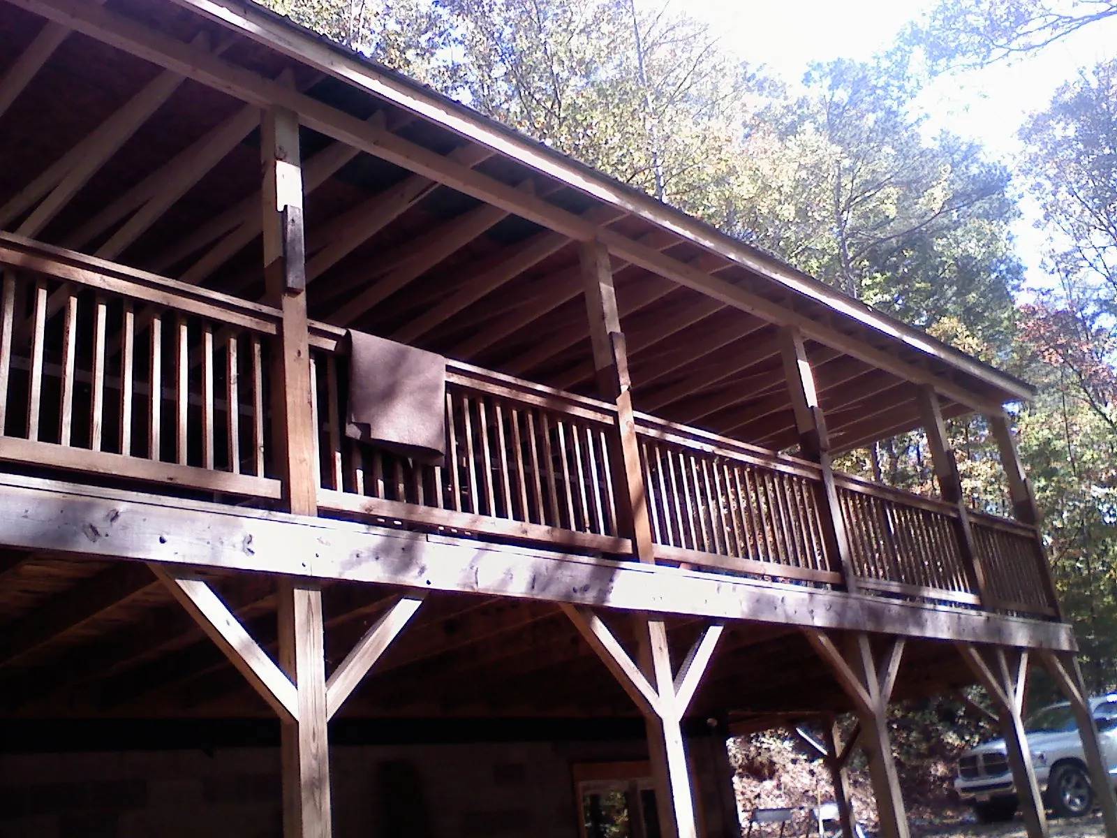 Timber framing under a new elevated porch and deck — Roof Leak Repair in Elmwood by Roofing Brothers